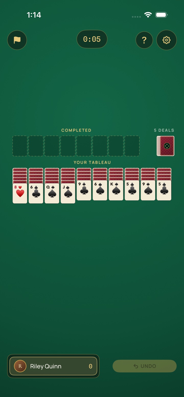 Four-suit Spider solitaire — ten columns under the completed-run slots and stock